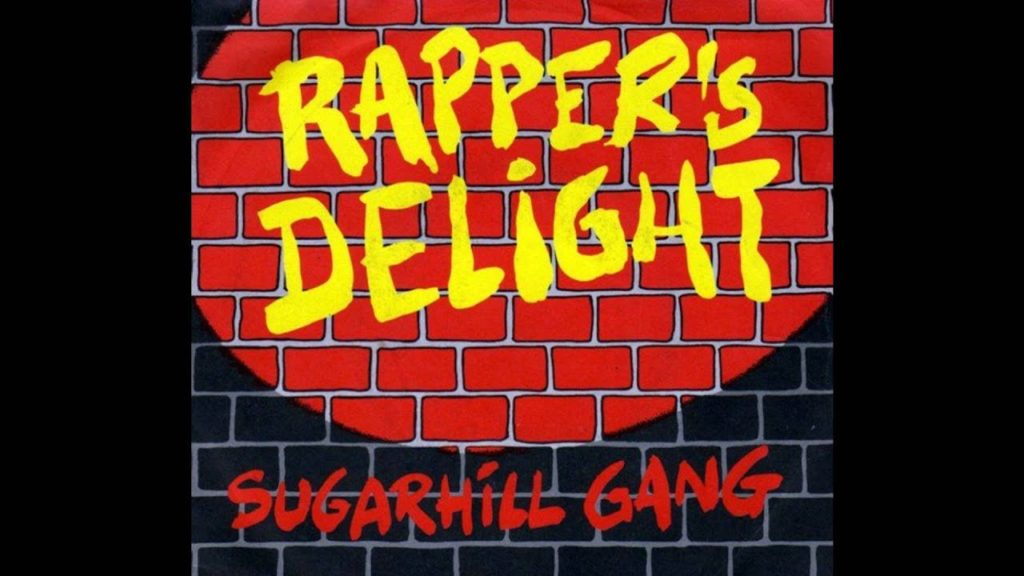 la copertina di "Rappers delight" della Sugarill Gang gialla su uno sfondo di mattoni rossi e neri