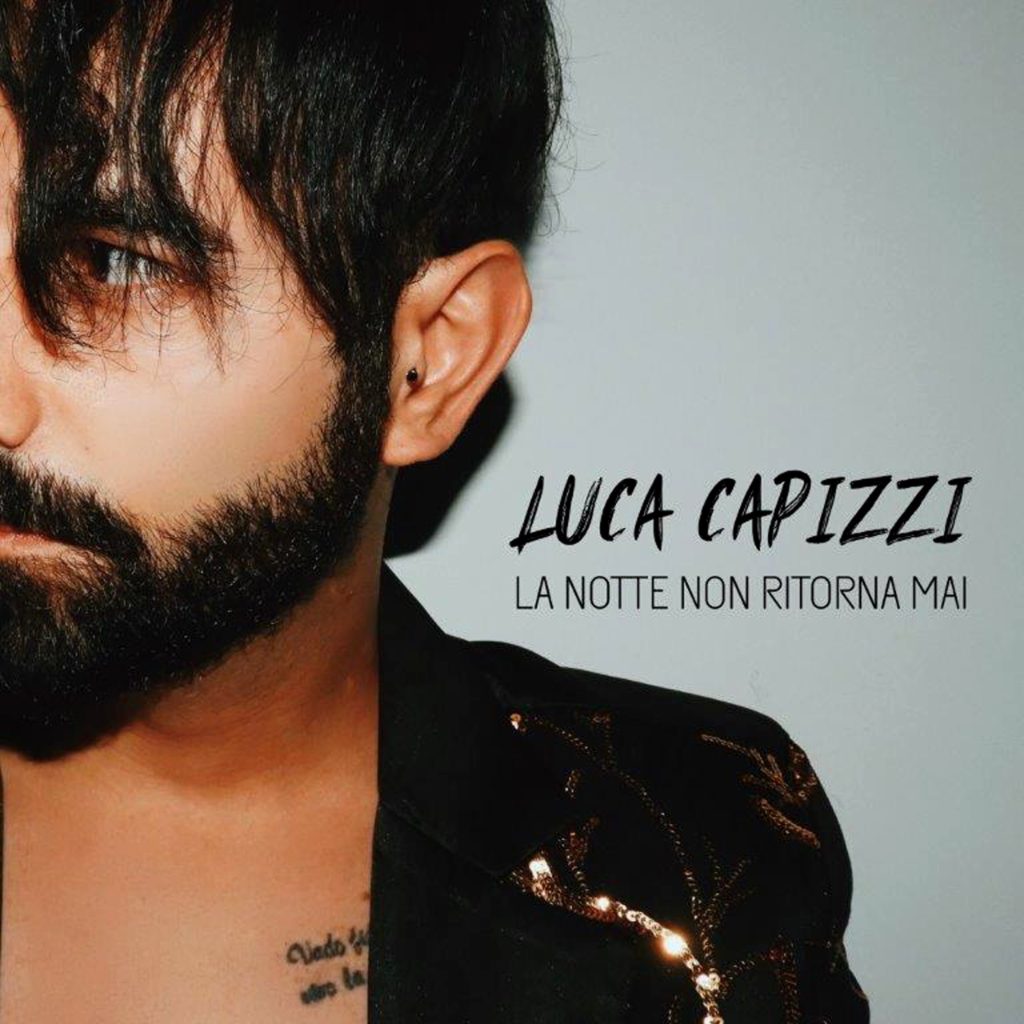 La copertina di La notte non ritorna mai di luca capizzi, con il viso a metà del cantante e la scritta, titolo della canzone