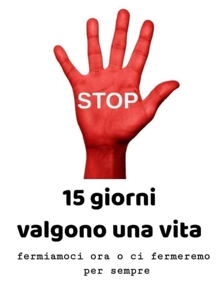 #iorestoacasa una mano rossa aperta con la scritta stop sul palmo e sotto "15 giorni valgono una vita"