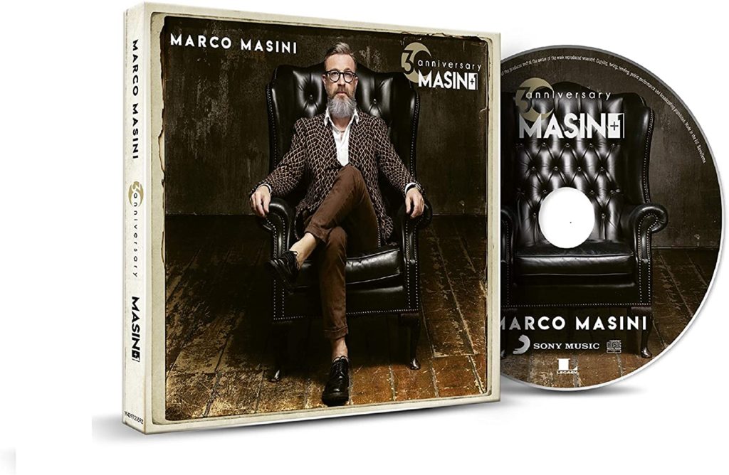 Masini +1 30th anniversary l'album di Marco Masini in copertina seduto su una poltrona