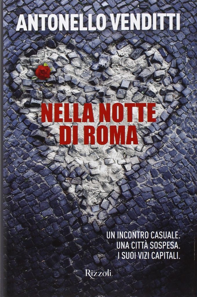 Nella notte di Roma di Antonello Venditti la copertina del libro su sfondo di ciottoli grigi un cuore bianco con il titolo al centro