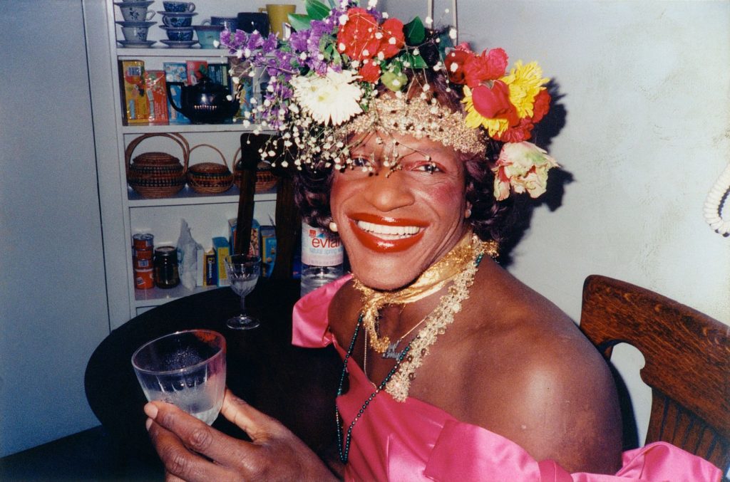 Marsha P. Johnson wearing make up and wig
