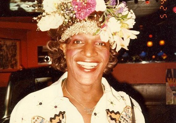 Marsha P . Johnson with wig. She smiles