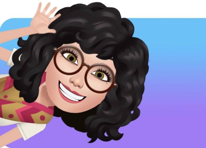 facebook avatar il fumetto di una donna con capelli neri ricci occhiali e con un sorriso saluta