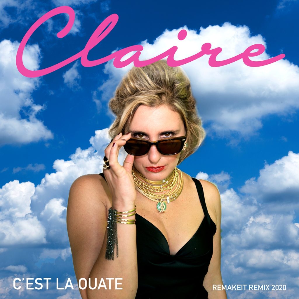 Claire c'est la ouate remix. Nella foto la cantante, bionda, con gli occhiali da sole, che indossa un vestito nero scollato. sullo sfondo un cielo con nuvole