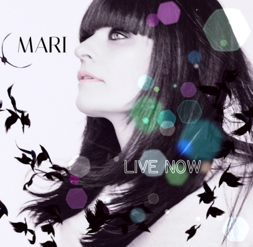 live now mari conti - la copertina del nuovo singolo che ritrae l cantante di profilo, capelli neri e lunghi, su sfondo bianco