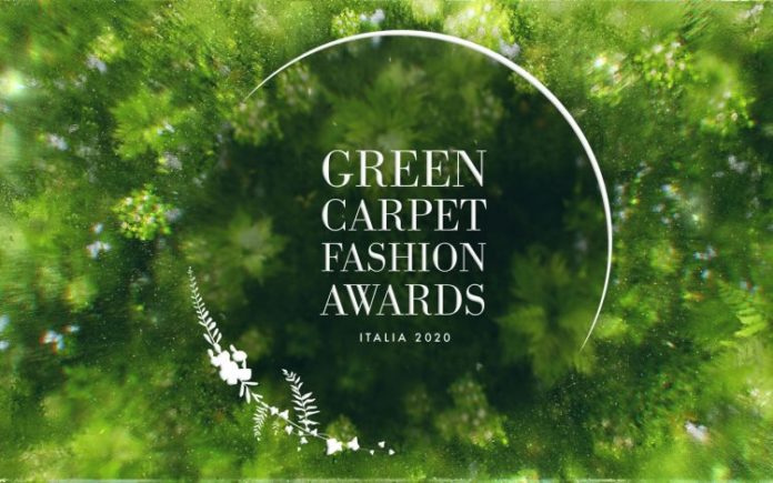 Fashion Channel - nella foto il logo dei Green Carpet Music Awards con la scritta al centro di un insieme di foglie verdi