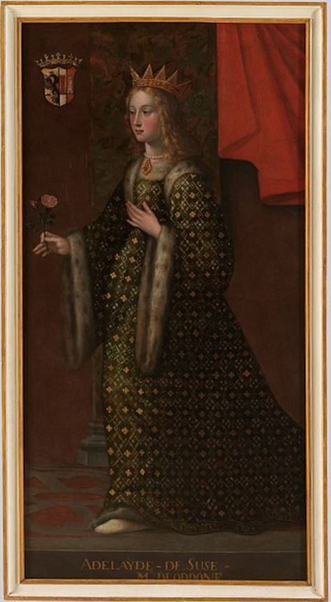 La marchesa Adelaide in un ritratto a figura intera con corona, abito lungo scuro, un bastone regale nella mano destra e l'altra appoggiata sul petto