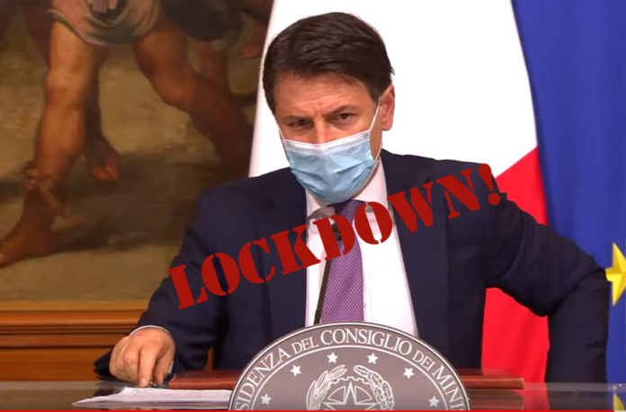 zone rosse e autocertificazione -Giuseppe Conte parla alla Camera con la scritta lockdown