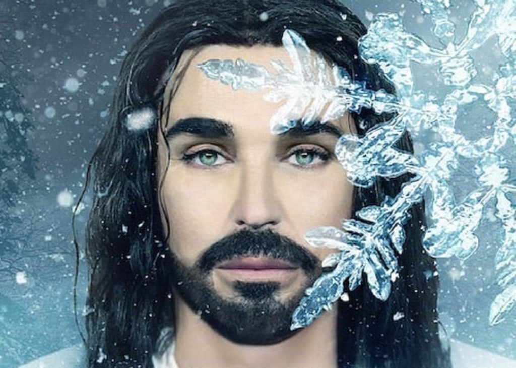 Shalpy let it snow - la copertina del singolo con il primo piano di Shalpy con capelli neri lunghi e un enorme fiocco di neve sulla destra