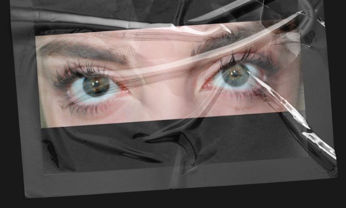Ivan Brunacci - Luna - la copertina del disco con sfondo nero, al centro due occhi di donna coperti da una pellicola trasparente