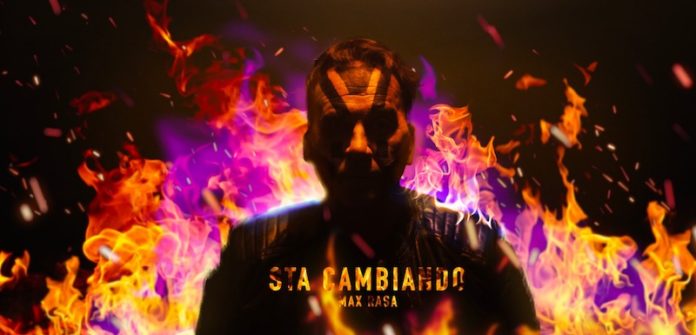 sta cambiando - la copertina del singolo che raffigura il cantante max rasa circondato dalle fiamme