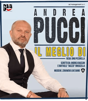 Andreaq Pucci conm camicia bianca,gillet e cravatta nera seduto con le mani sulle ginocchia