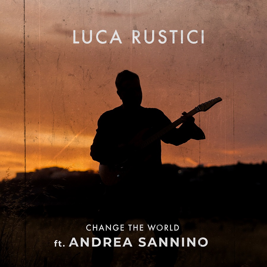 change the world - la copertina del singolo che inquadra luca rustici, in chiaroscuro al tramonto, con la chitarra a tracolla