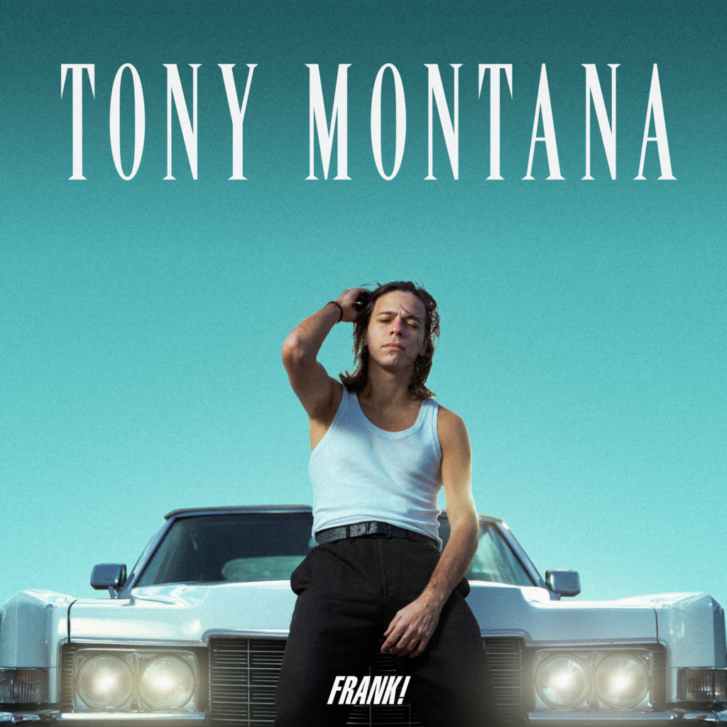 tony montana - la copertina del singolo che ritra frank! in canotta bianca e pantaloni scuri, seduto sul cofano di una cadillac bianca