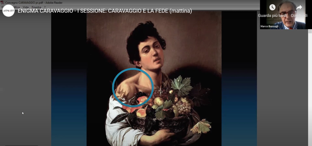 Caravaggio e l'enigma del ragazzo con il cesto di frutta. Imamgine dal webinar con in evidenza la spalla.