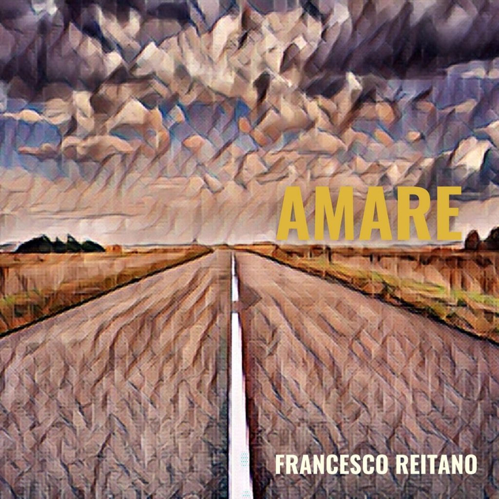 amare - la copertina del singolo di francesco reitano, che è un quadro raffigurante una strada in mezzo ai campi, sotto un cielo nuvoloso