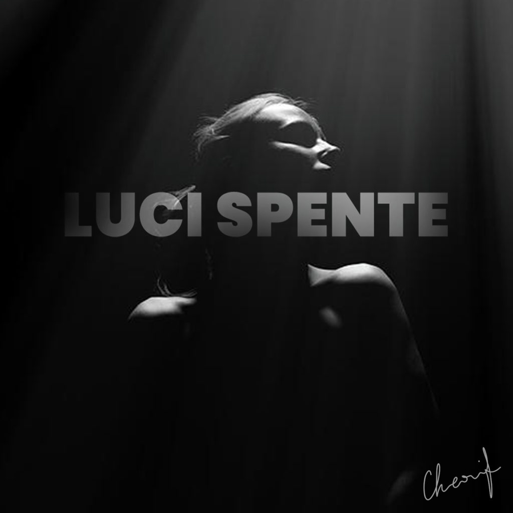 luci spente - la copertina del singolo di cherif, che lo ritrae in primo piano, in uuna foto in bianco e nero