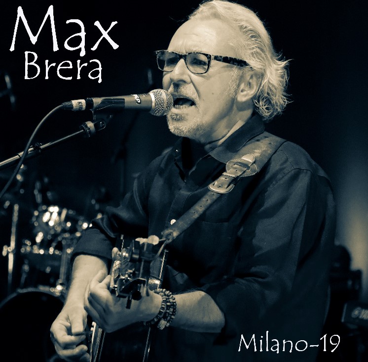 max brera - la copertina di milano-19 che lo ritrae davanti al miscrofono, intento a cantare, con la chitarra a tracolla