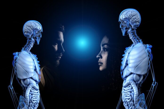 sentimenti inquinati . un uomo e una donna di profilo, insieme a due scheletri, al centro la luna