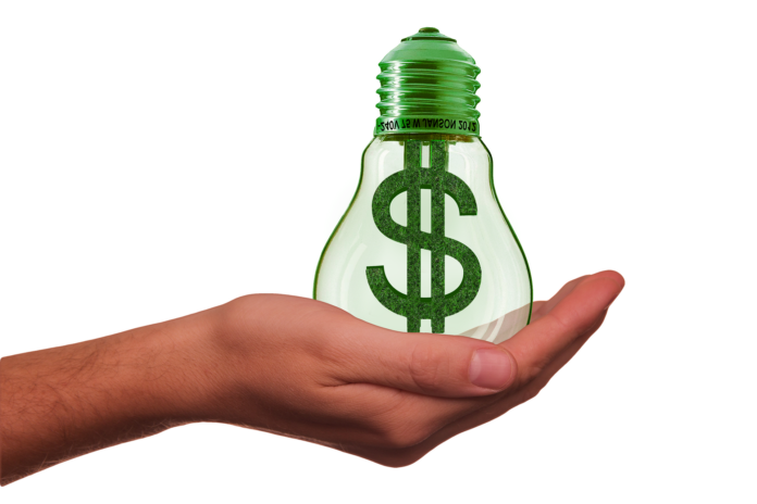 investire green - una mano sorregge una lampadina al cui interno c'è il simbolo del dollaro