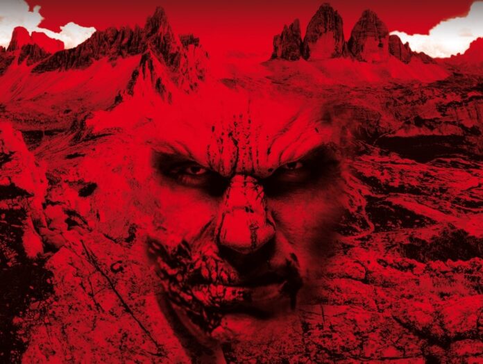 la voce del carpaccio - la copertina del libro con una montagna tutta rossa dal cui pendio fuoriesce un volto demoniaco