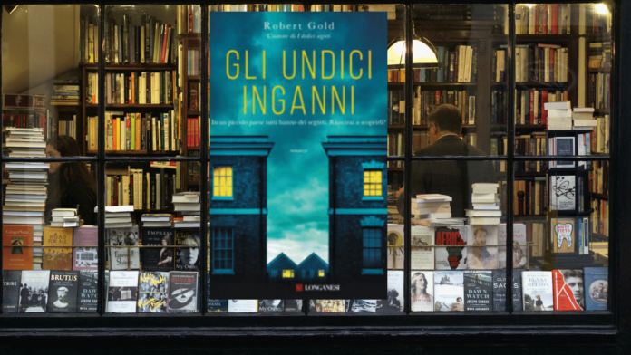 il libro unidii inganni di robert gold in una vetrina di libreria