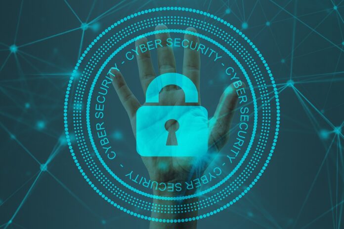 Riconoscimento facciale privacy - nella foto con sfondo azzurro una mano dietro un cerchio doppio dove c'è la scritta digital security