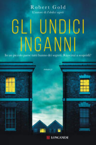 copertina di undici inganni di Robert Gold  titolo in giallo due case di fianco con una luce accesa in alto fondo turchede sembra sera