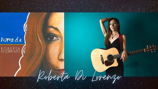 roberta di lorenzo - la copertina del nuovo album "nomade" che la ritra in piedi, vestita di nero, con una chitarra elettrica a tracolla