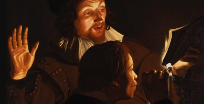due suonatori in un chiaroscuro a olio di Adam de Coster
