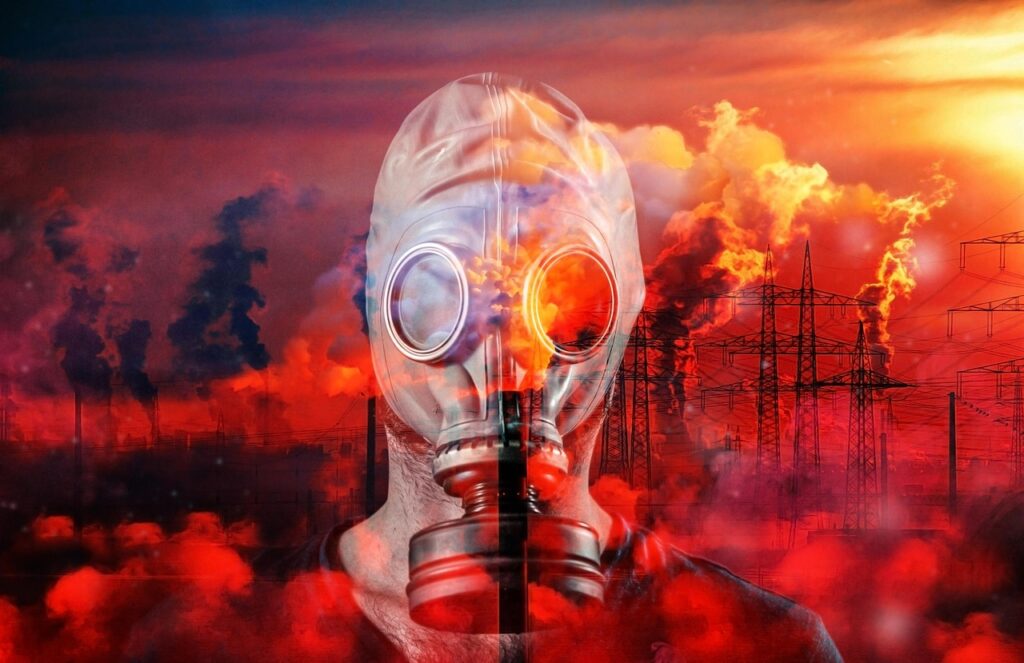 Apocalisse Climatica - un giornale riporta una foto rossa apocalittica con in primo piano un uomo che indossa una maschera antigas e dietro di lui tutto ilmondo brucia