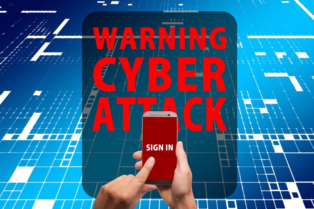 SMS polizia postale - le mani di un uomo su un cellulare su cui c'è la schermata rossa "Sign in" e dietro la scritta "warning cyber attack, su sfondo blu cibernetico