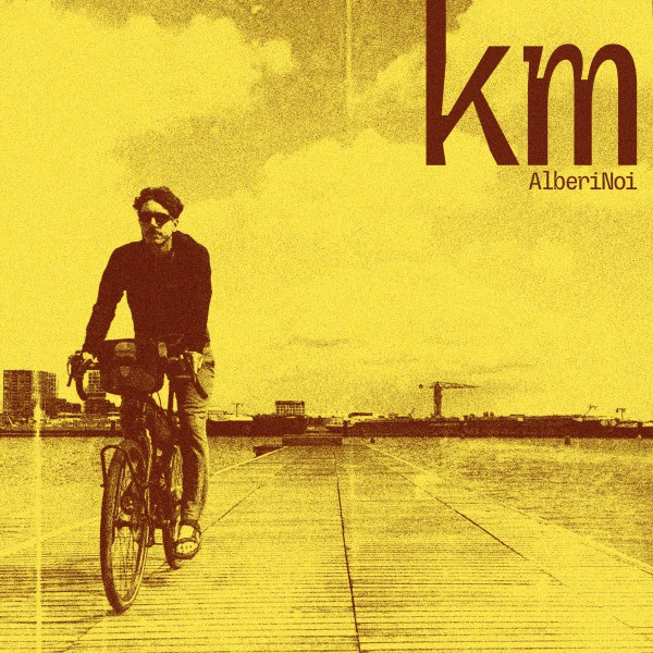 alberinoi - la copertina del nuovo singolo che raffigura un uomo in bicicletta su una strada deserta
