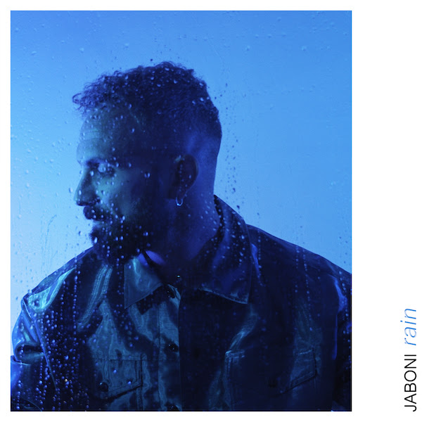 rain - la copertina del nuovo singolo di jaboni che lo ritrae di profilo, con un giubbotto di pelle scura