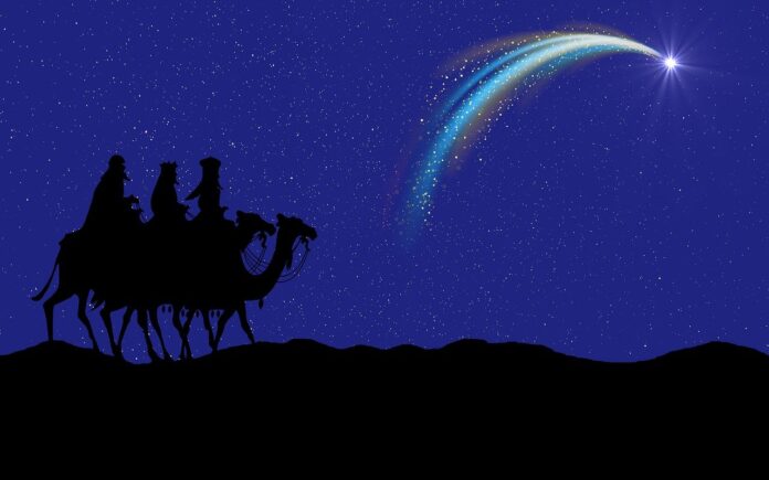 Re magi - sfondo blu notte figure nere di tre cammelli con tre uomini sopra che guardanouna stella cometa nel cielo
