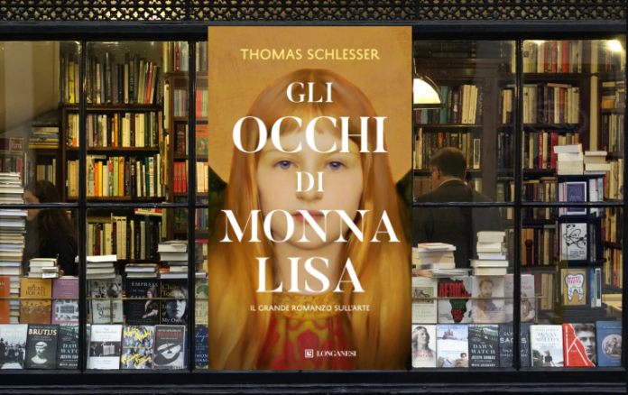 una vetrina di libreria con il libro gli occchi di Monna lisa in centro