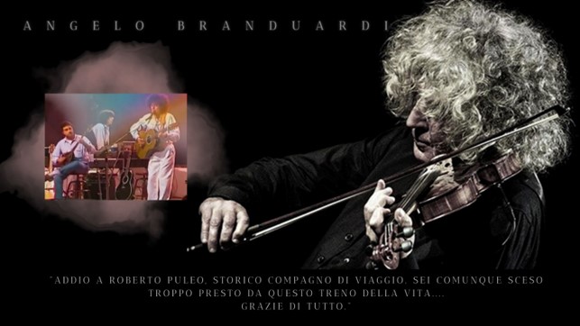 roberto puleo e angelo branduardi (intento a suonare il violino)