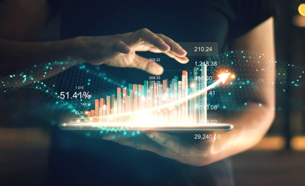 AI Act - una persona tiene in mano uno schermo dal quale esce in £D un grafico