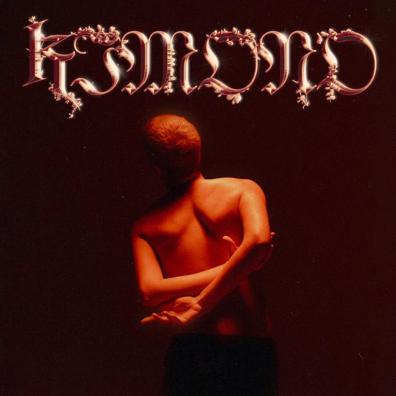 kimoni - la copertina del nuovo singolo di giovanni segreti bruno, che lo raffigura di spalle, nudo dalla cintola in su, con le braccia incrociate sulla schiena