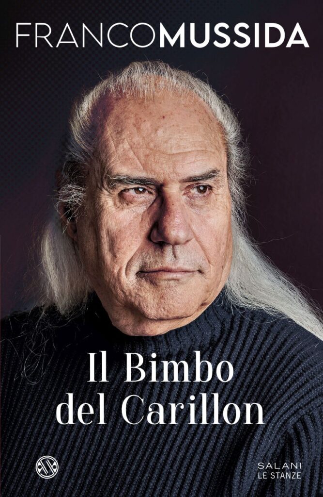 franco mussida in primo piano nella copertina del suo libro autobiografico, il bimbo del carillon